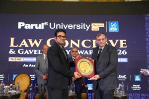 "Justice Maulik Jitendra Shelat speaking on AI in courtrooms at Law Conclave 2026"