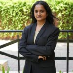 Parul University btech student selected by Amazon for an operations role" | Portrait or campus photo of the student, captioned with programme and Amazon selection.