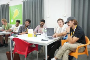 Founders conducting field research and customer interviews to validate a startup idea